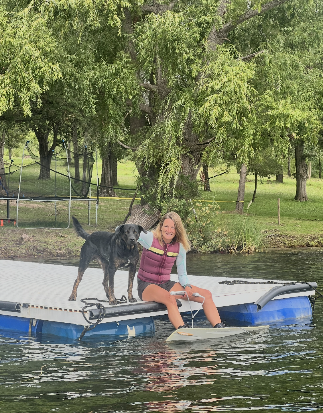 On the floating dock with the club dog